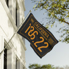 Vintage-style California 186.22 polyester flag with black and gold artwork